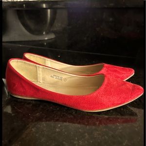 Red suede pointy flats. Size 6 ! Perfect for work and the summer .
